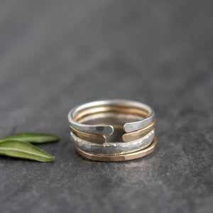 textured stacking ring collaboration with huskmilk pottery