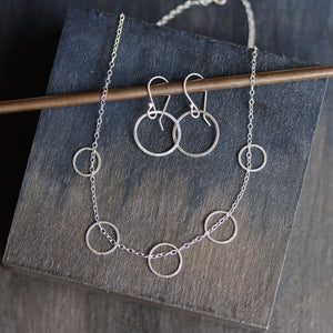 Skipping Stone Necklace & Oh Earrings Set