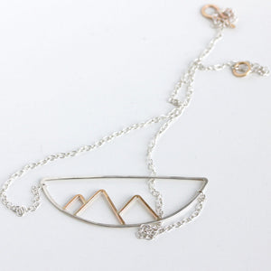 Telluride Necklace in Mixed Metal On A White Background